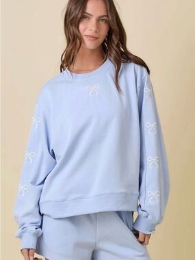 Altar’d State Revival Light Blue Bow-Accent Crewneck Sweatshirt